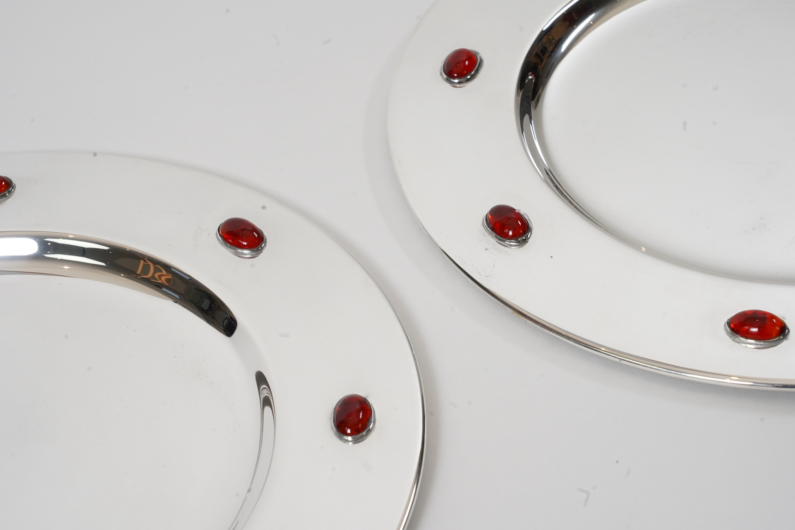 A set of six Glasgow School Arts & Crafts silver plated and cabochon glass set dinner plates